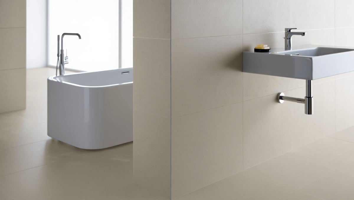 Adieu les carreaux dans la salle de bain : cette
tendance sans joint et facile à nettoyer s'impose dans nos foyers
en 2026